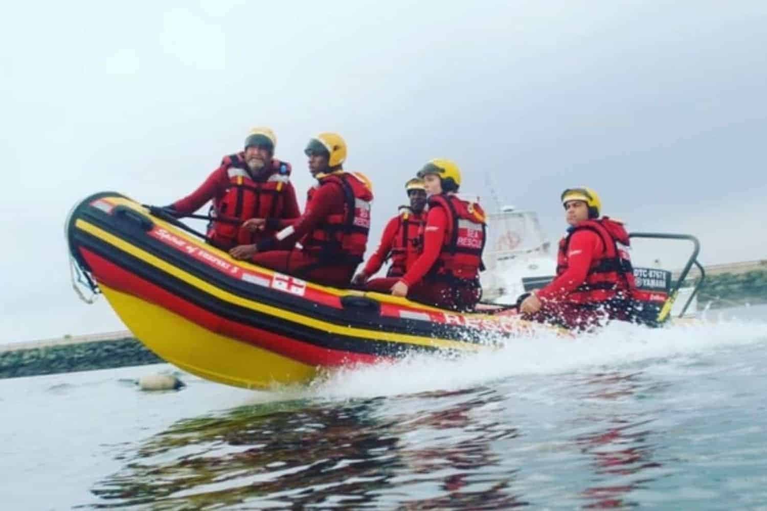 Whales breach as NSRI rescues surf‑skier off Simon’s Town